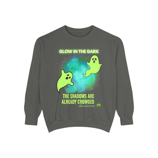 A grey sweatshirt with a glow-in-the-dark ghost design.
