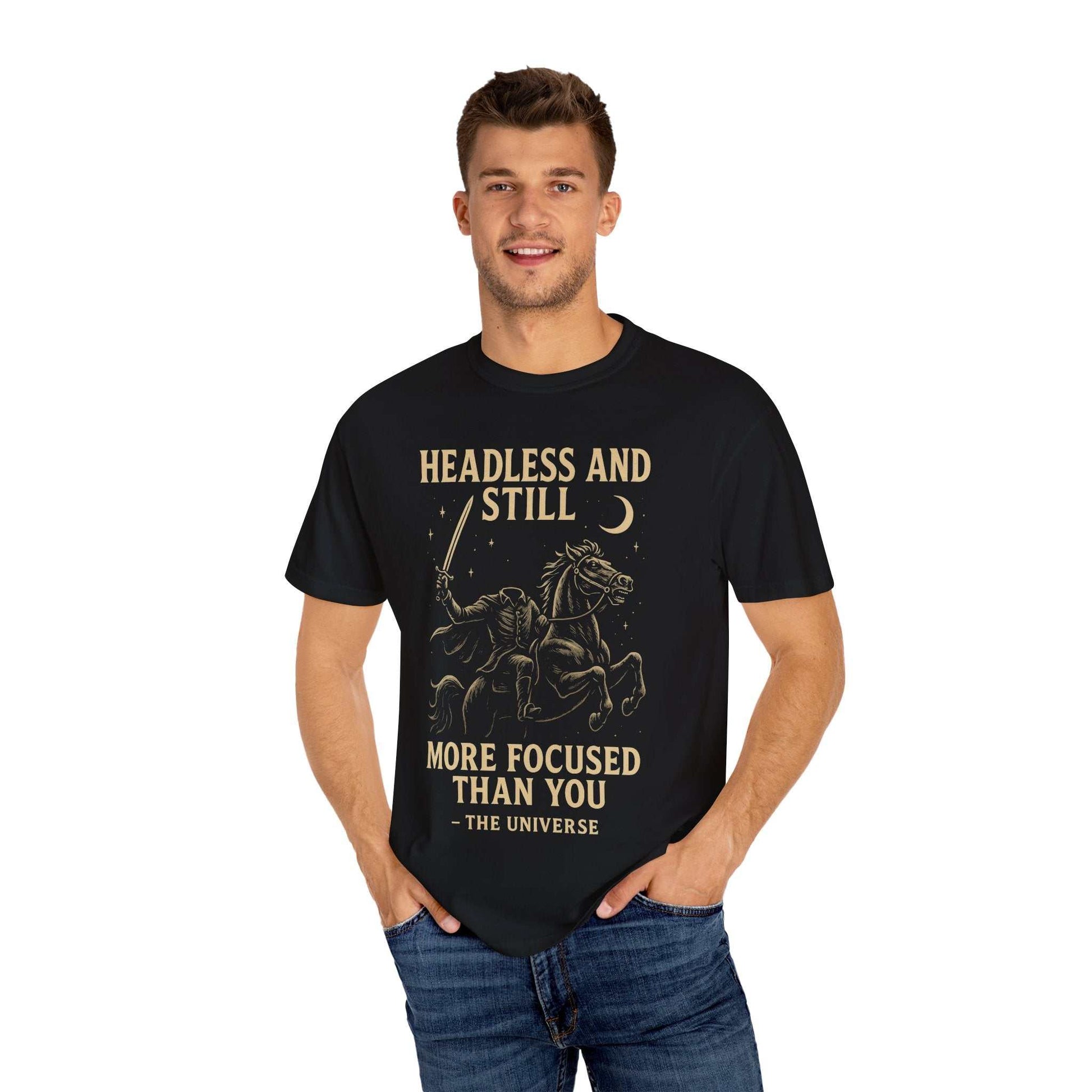 Man wearing black Headless Horseman shirt with motivational Halloween design and eco-friendly print