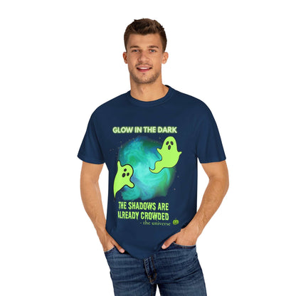 A navy blue t-shirt with a glow-in-the-dark ghost and planet design.
