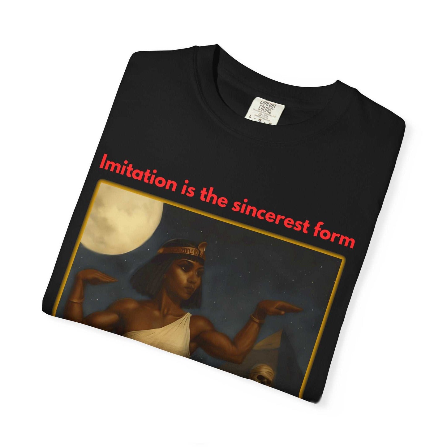 Folded black Egyptian Mummy T-Shirt featuring Cleopatra-themed graphic and text "Imitation is the sincerest form"