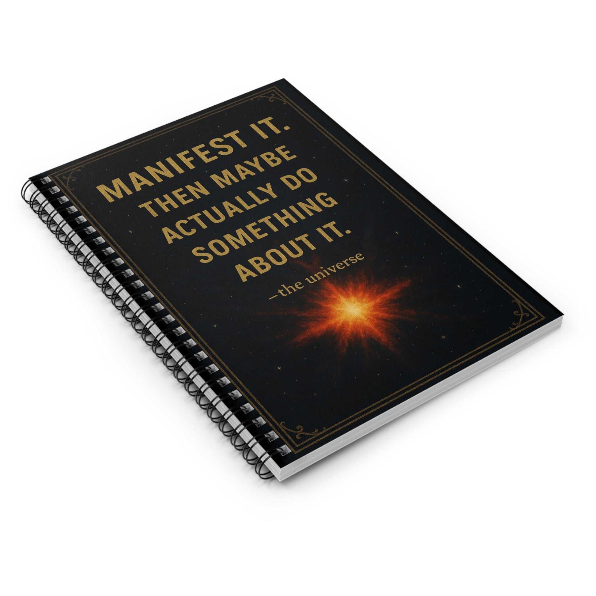 Manifest It Spiral Notebook with gold lettering and cosmic design on black matte cover, motivational journal with metal spiral binding and ruled pages