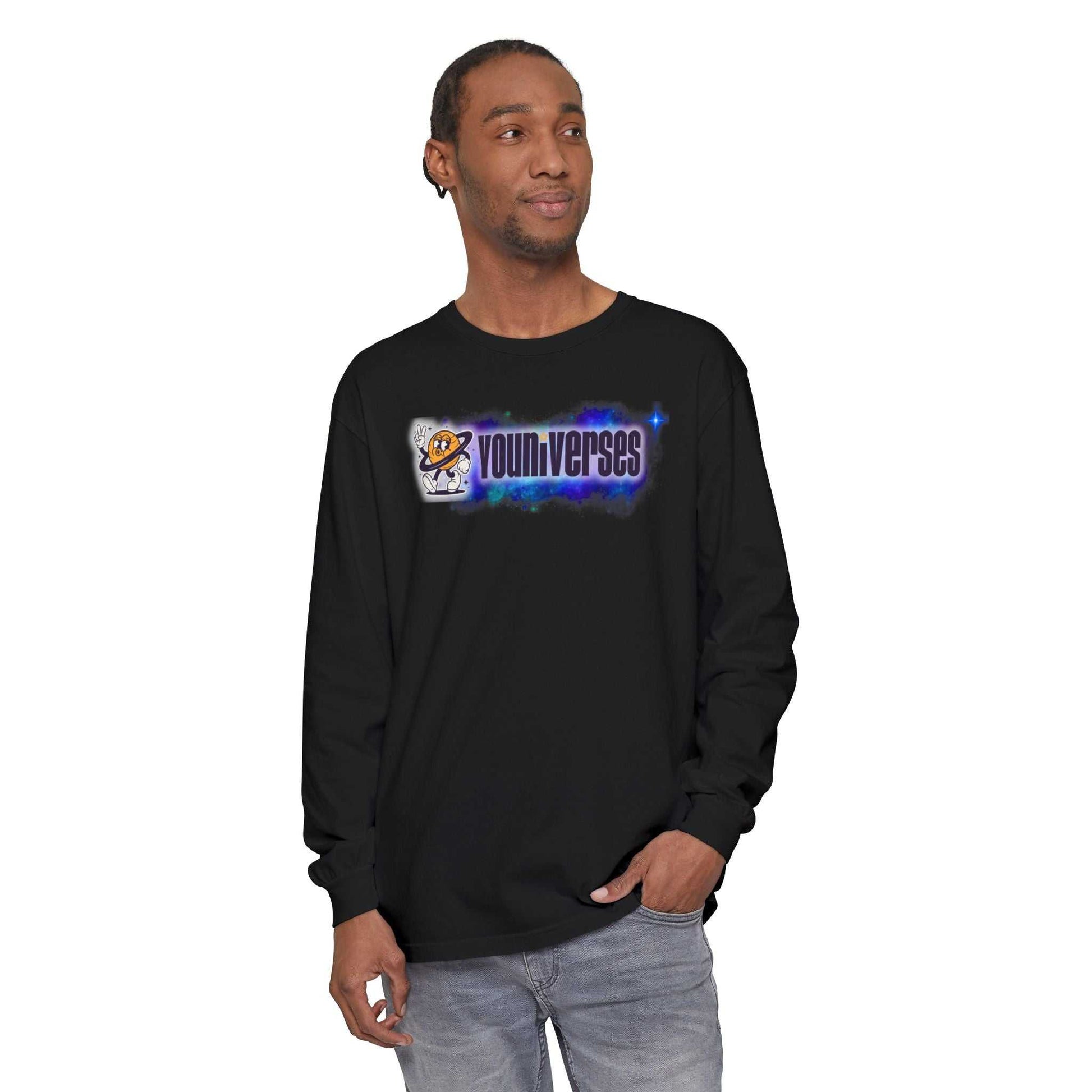 man wearing Youniverses Space Logo black long sleeve garment-dyed cotton tee with cosmic graphic