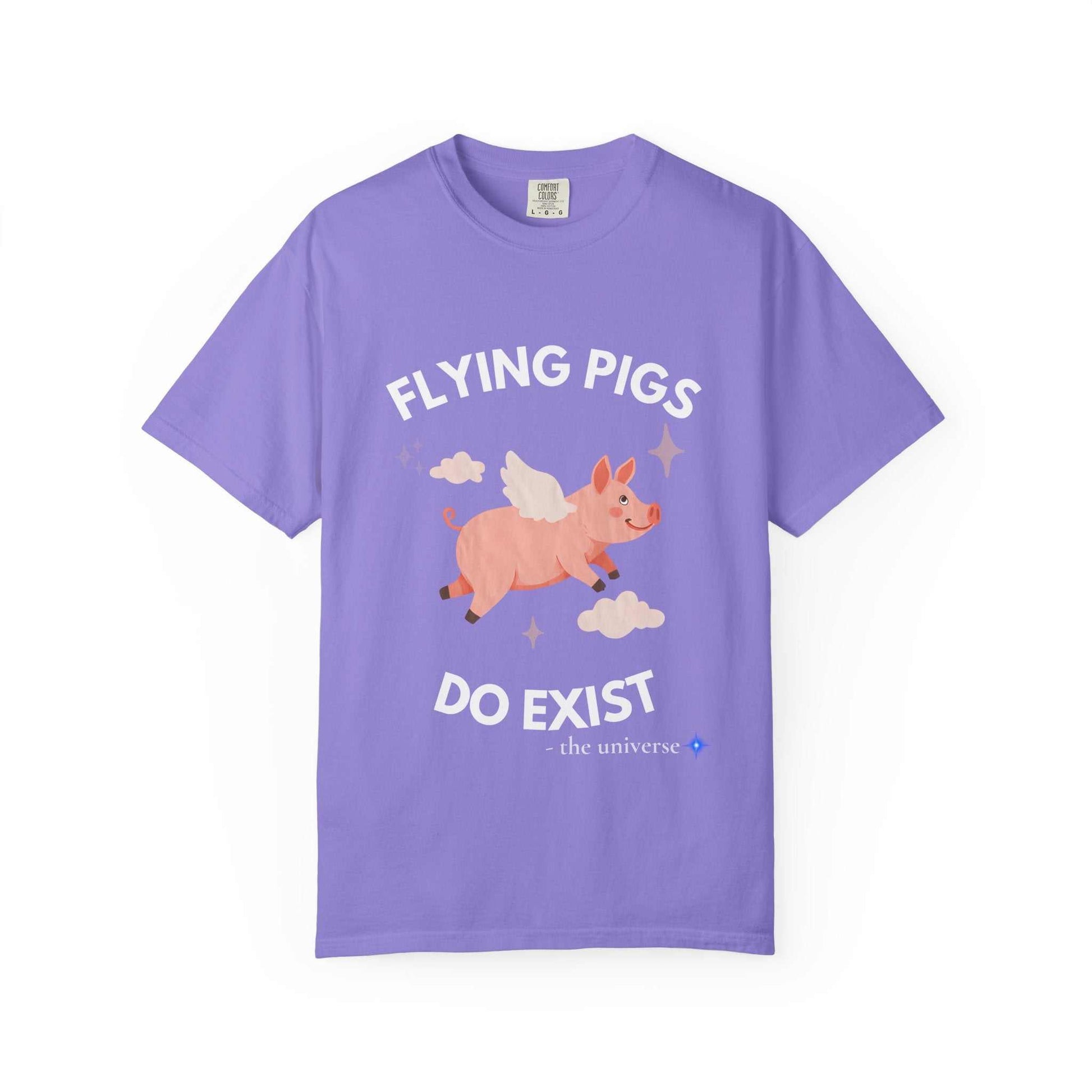A purple t-shirt with a graphic of a flying pig and the text "Flying Pigs Do Exist".