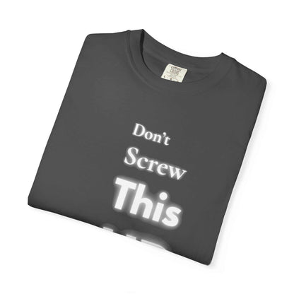 Folded dark gray "Don't Screw This Up" motivational graphic t-shirt made of soft cotton with garment-dyed finish