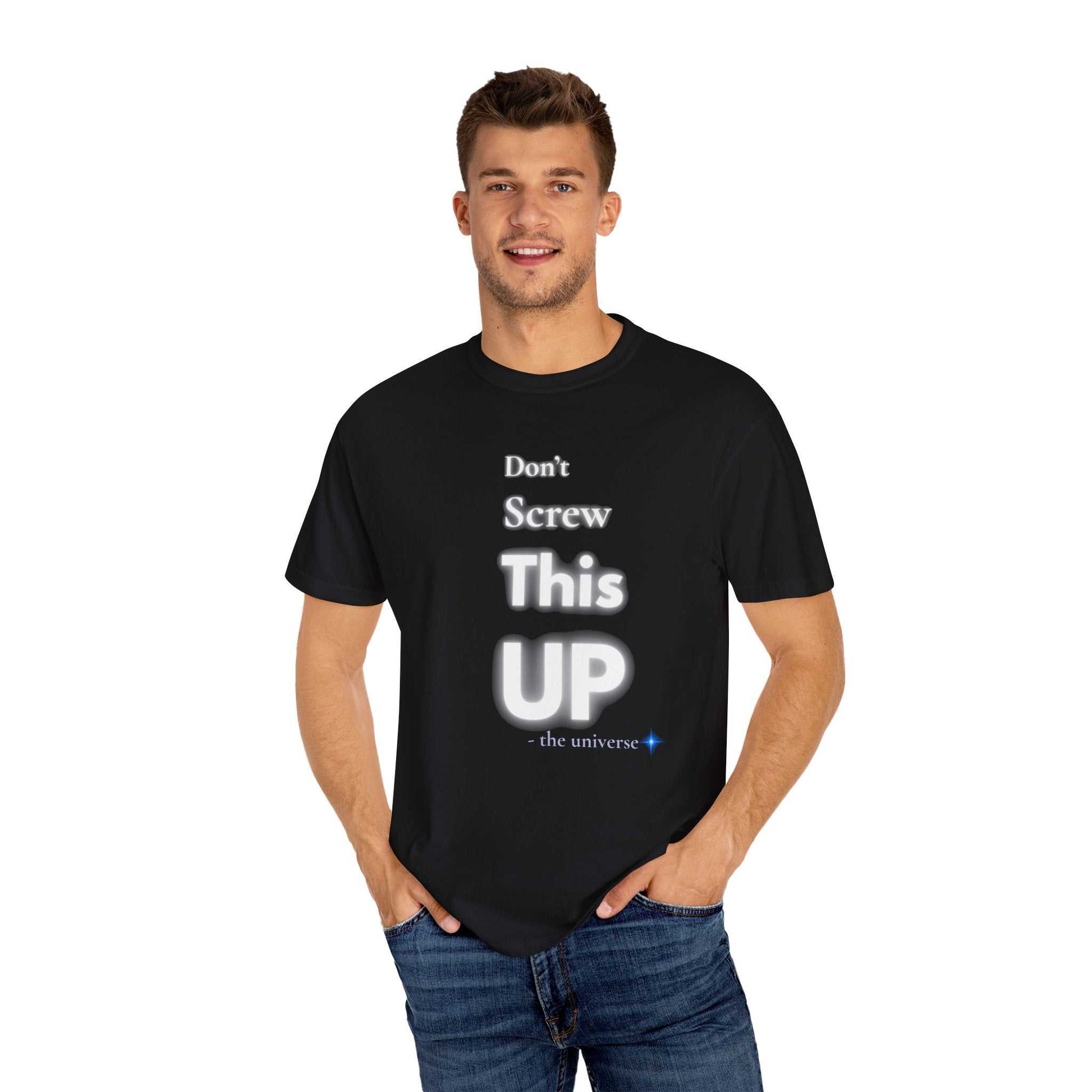 Man wearing black "Don't Screw This Up" motivational graphic tee with casual jeans