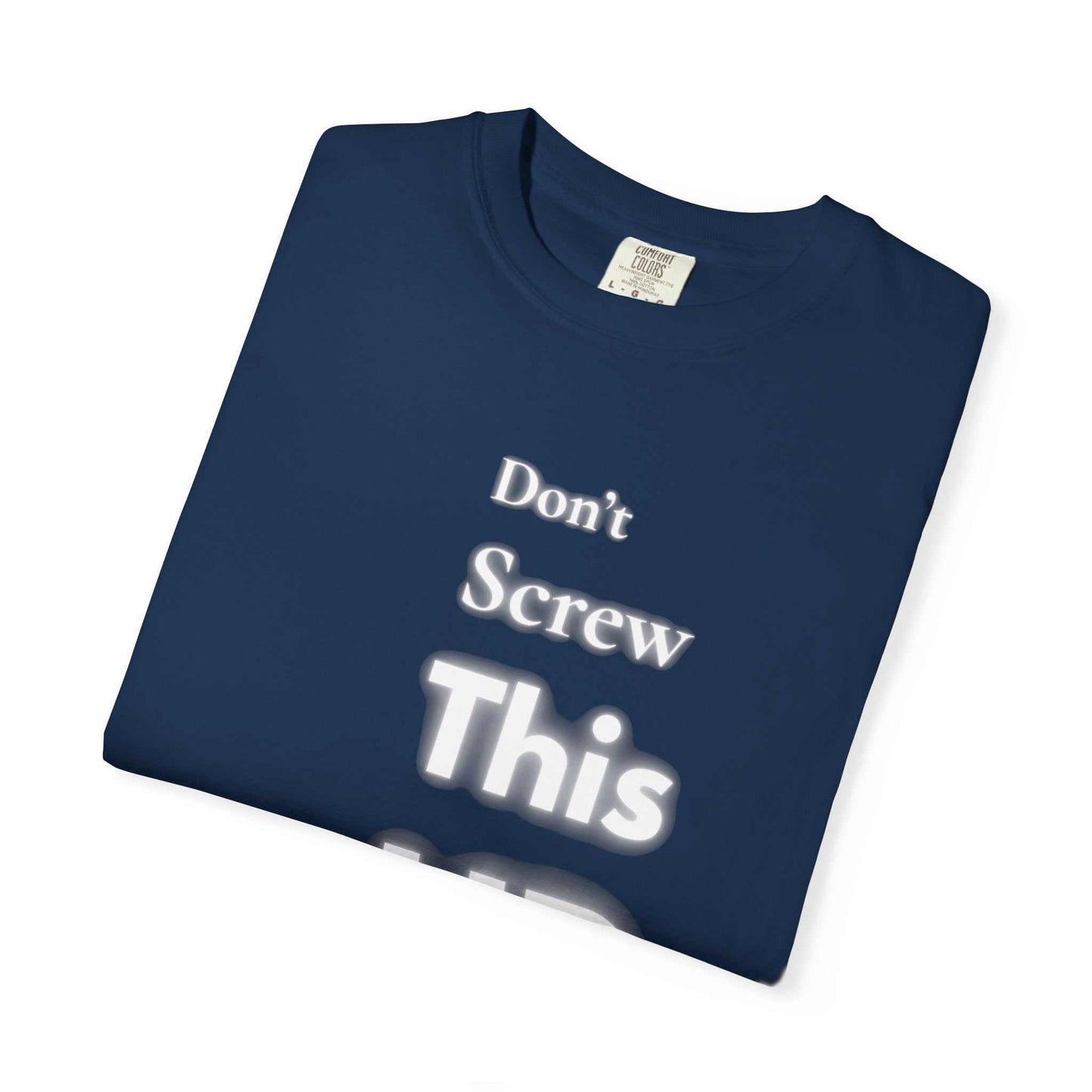 Folded navy blue "Don't Screw This Up" motivational graphic t-shirt with soft garment-dyed cotton fabric