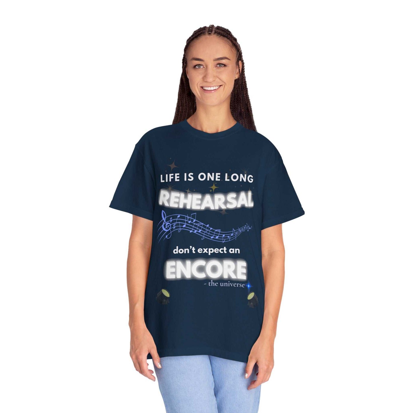 A woman wears a navy t-shirt with the text "Life is one long rehearsal, don't expect an encore."