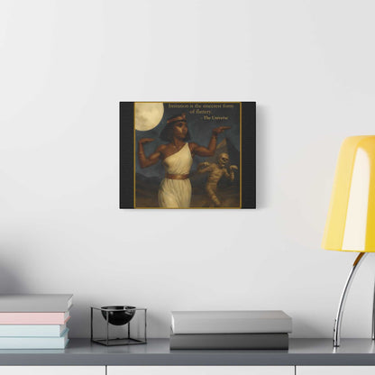 Modern wall art with Egyptian woman and mummy under moon, displayed above minimalist desk