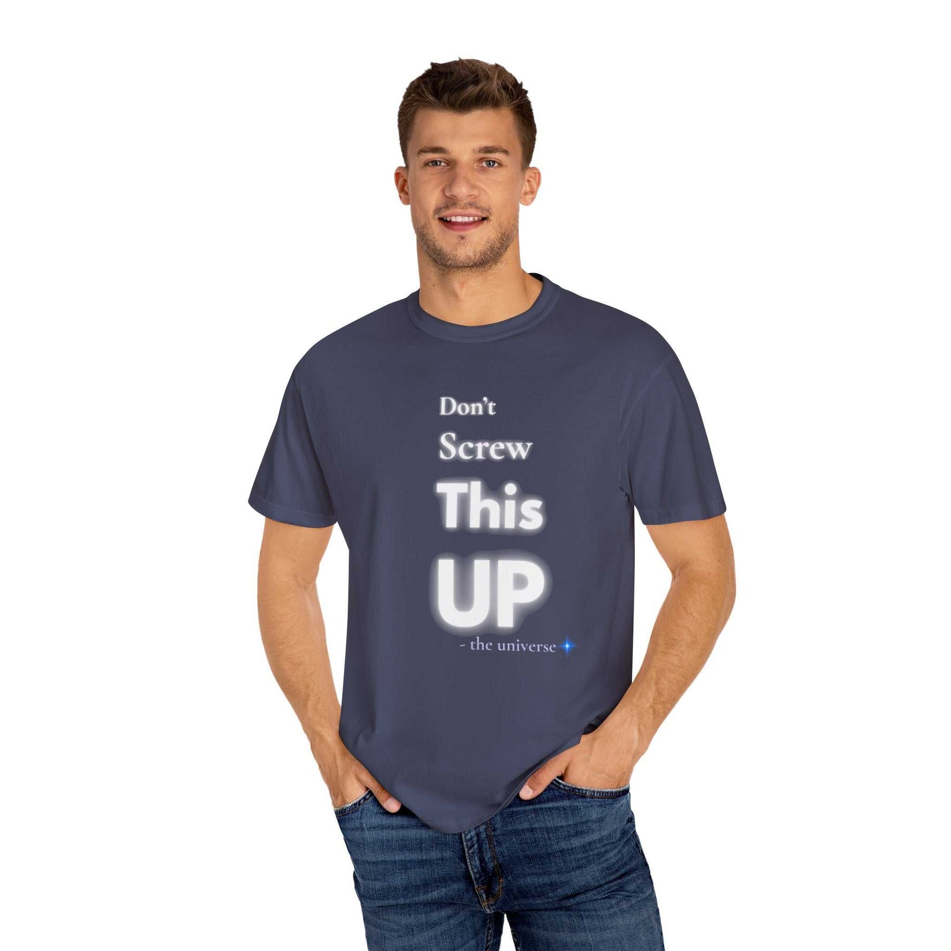Man wearing navy blue "Don't screw this up" motivational graphic t-shirt with casual jeans