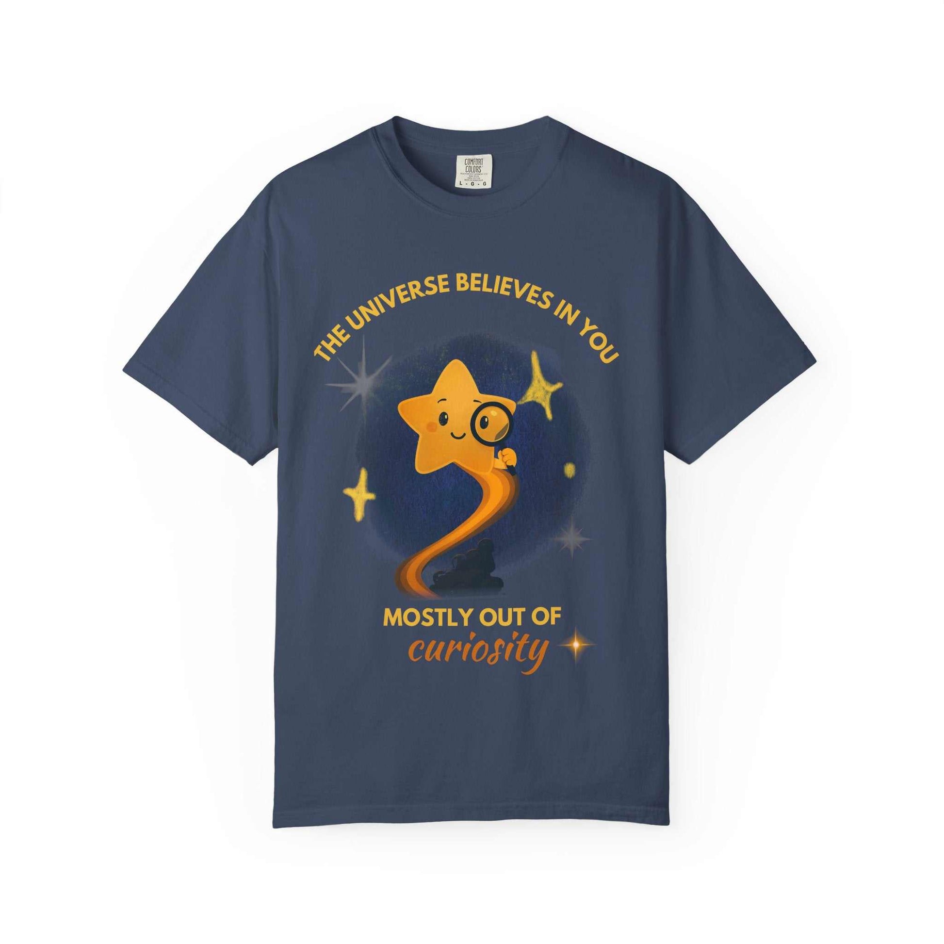 A navy t-shirt with a graphic of a star looking through a magnifying glass.
