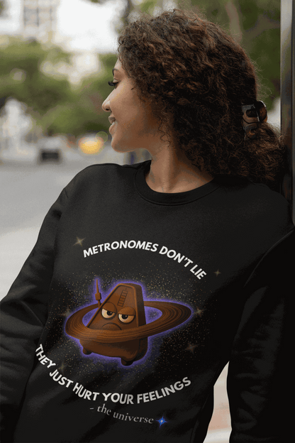 Black sweatshirt with a grumpy metronome in space and the text "Metronomes Don't Lie".