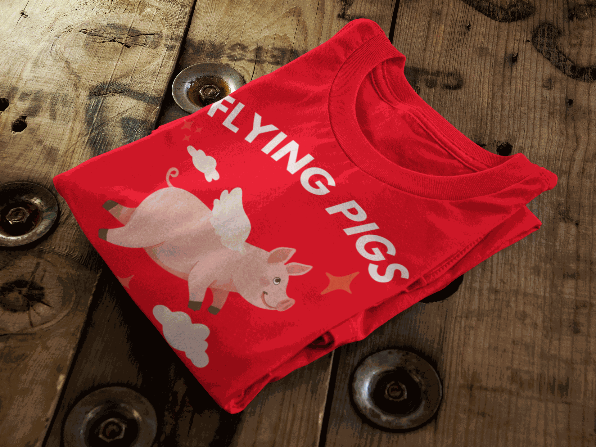 Red t-shirt with a graphic of a flying pig and the text "Flying Pigs".