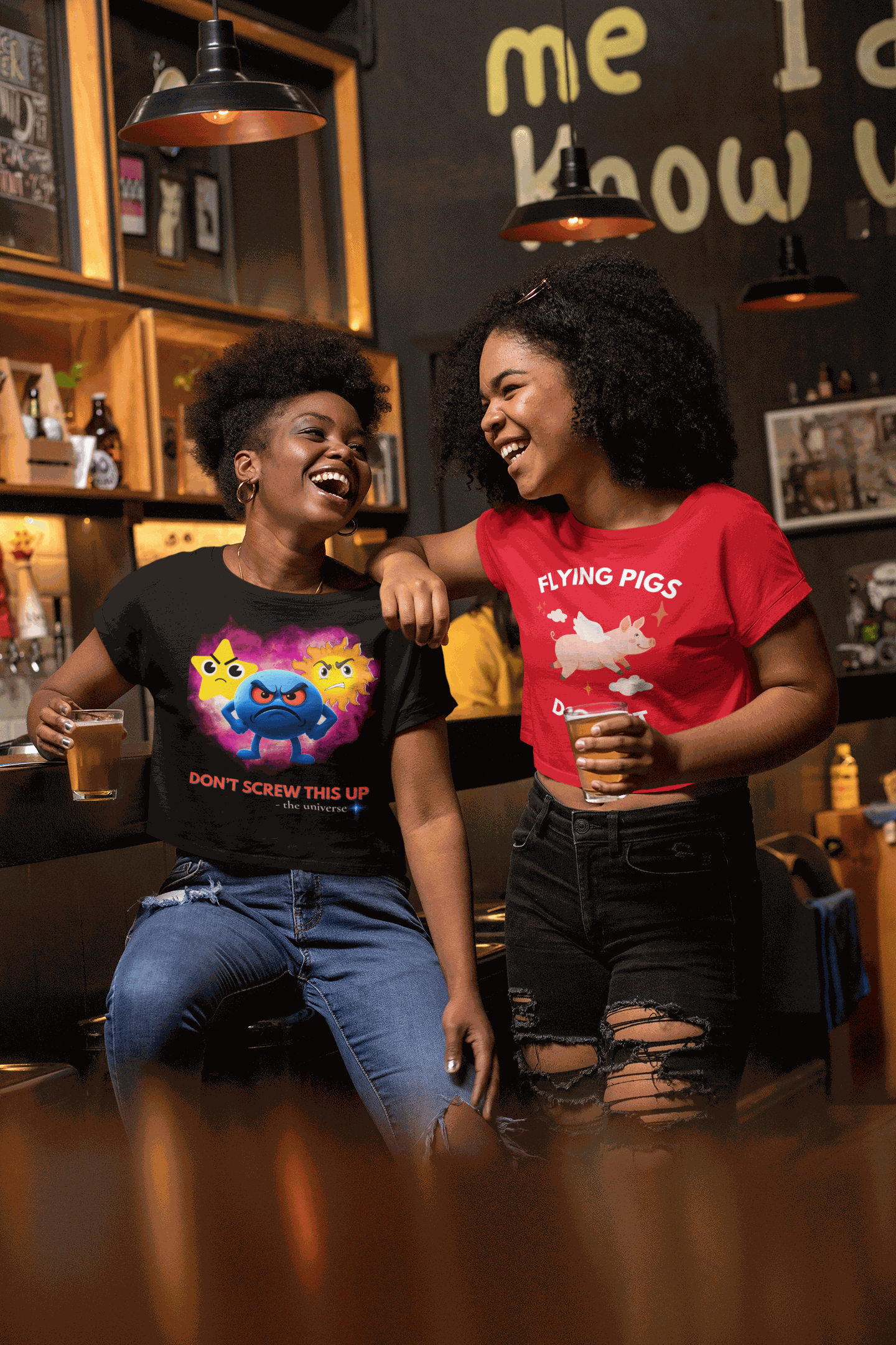 Black t-shirt with a cosmic design and text.