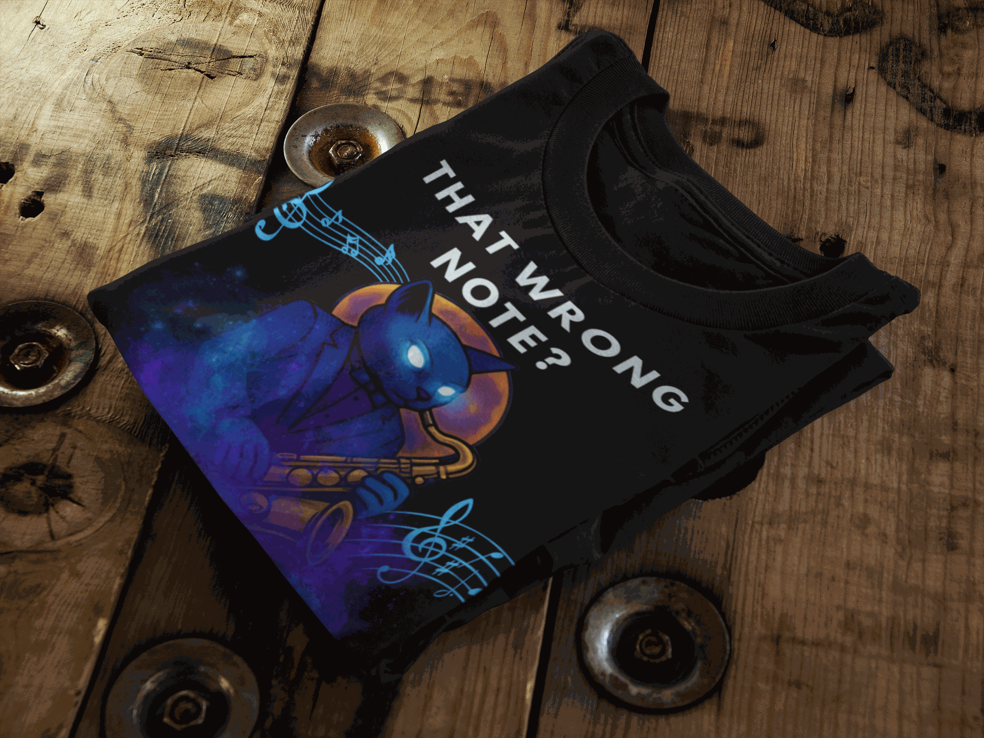 Black t-shirt with a blue cat playing a saxophone and musical notes.
