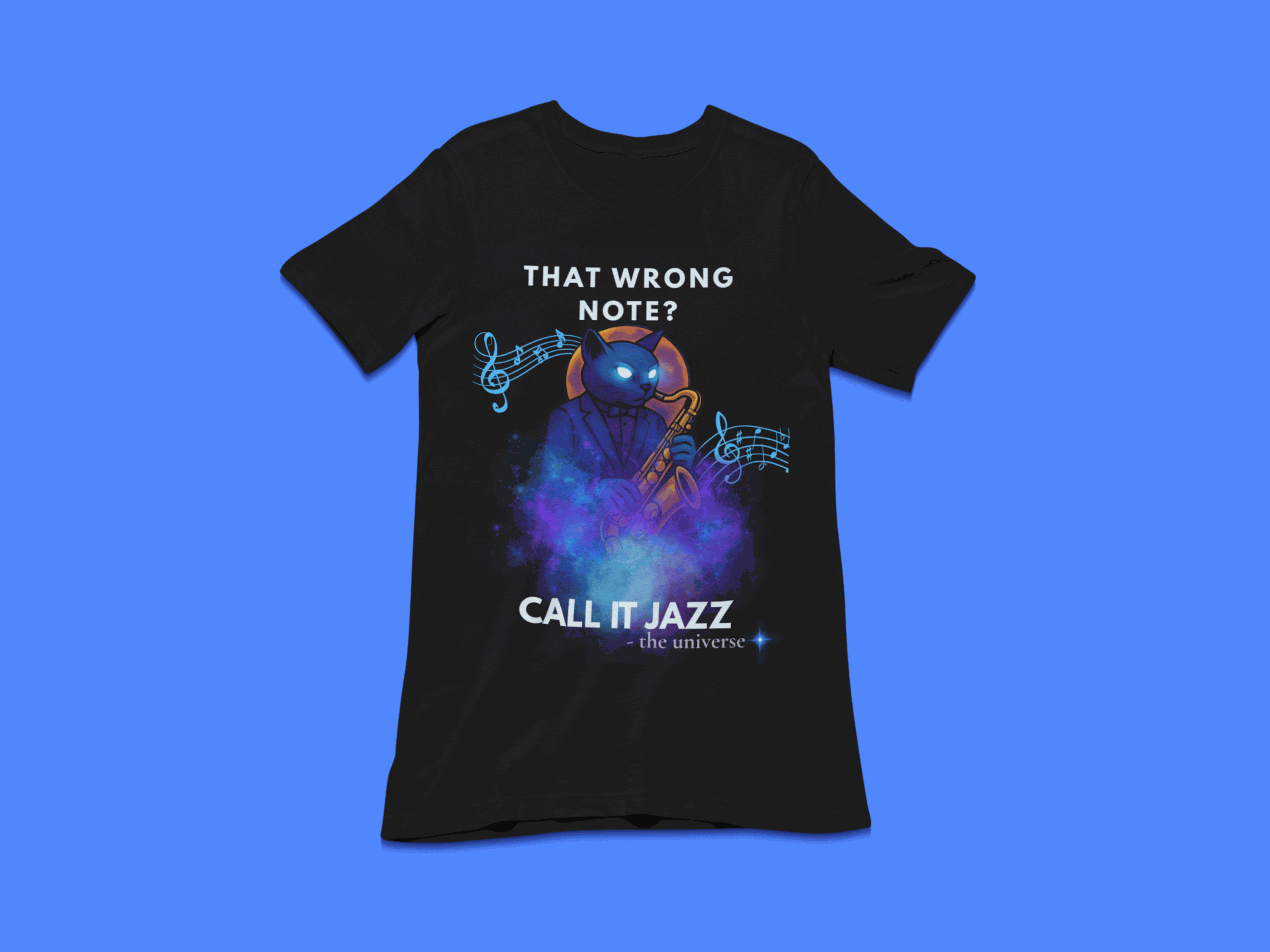 A black t-shirt with a cosmic cat playing a saxophone and the text "That Wrong Note? Call It Jazz".