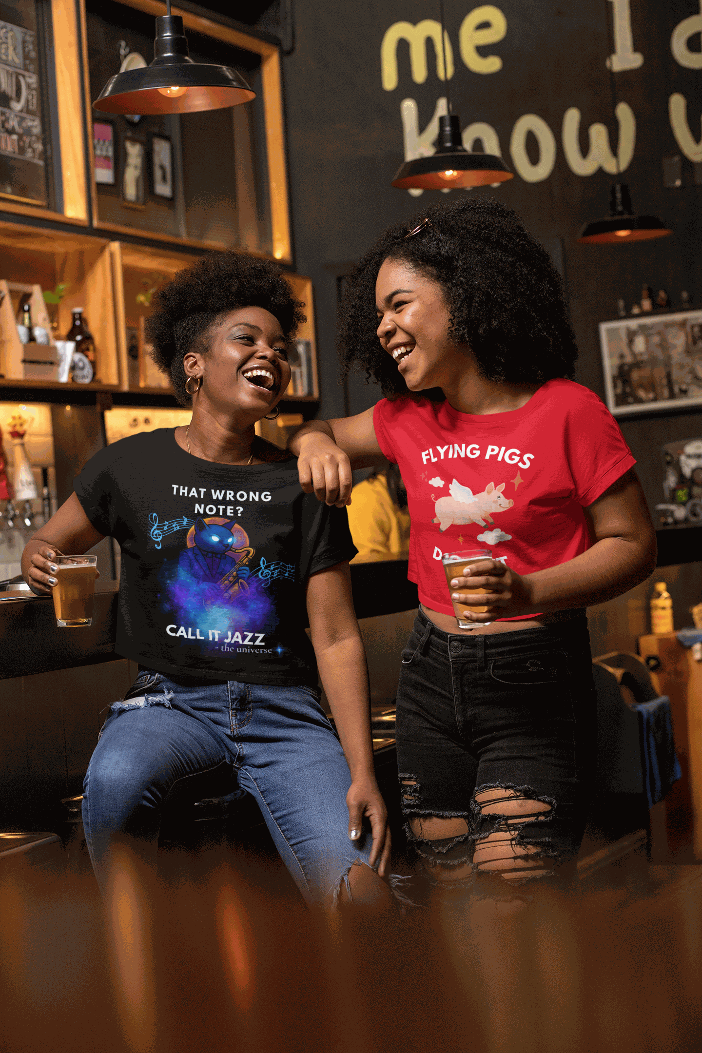 A black t-shirt with a cosmic cat playing a saxophone and the text "That Wrong Note? Call It Jazz".