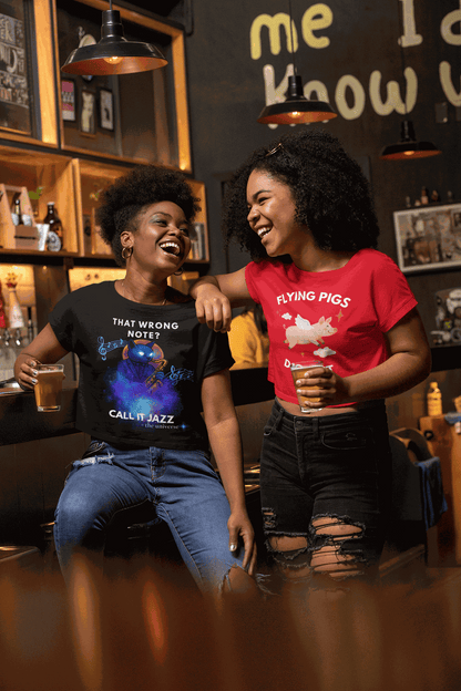 A black t-shirt with a cosmic cat playing a saxophone and the text "That Wrong Note? Call It Jazz".