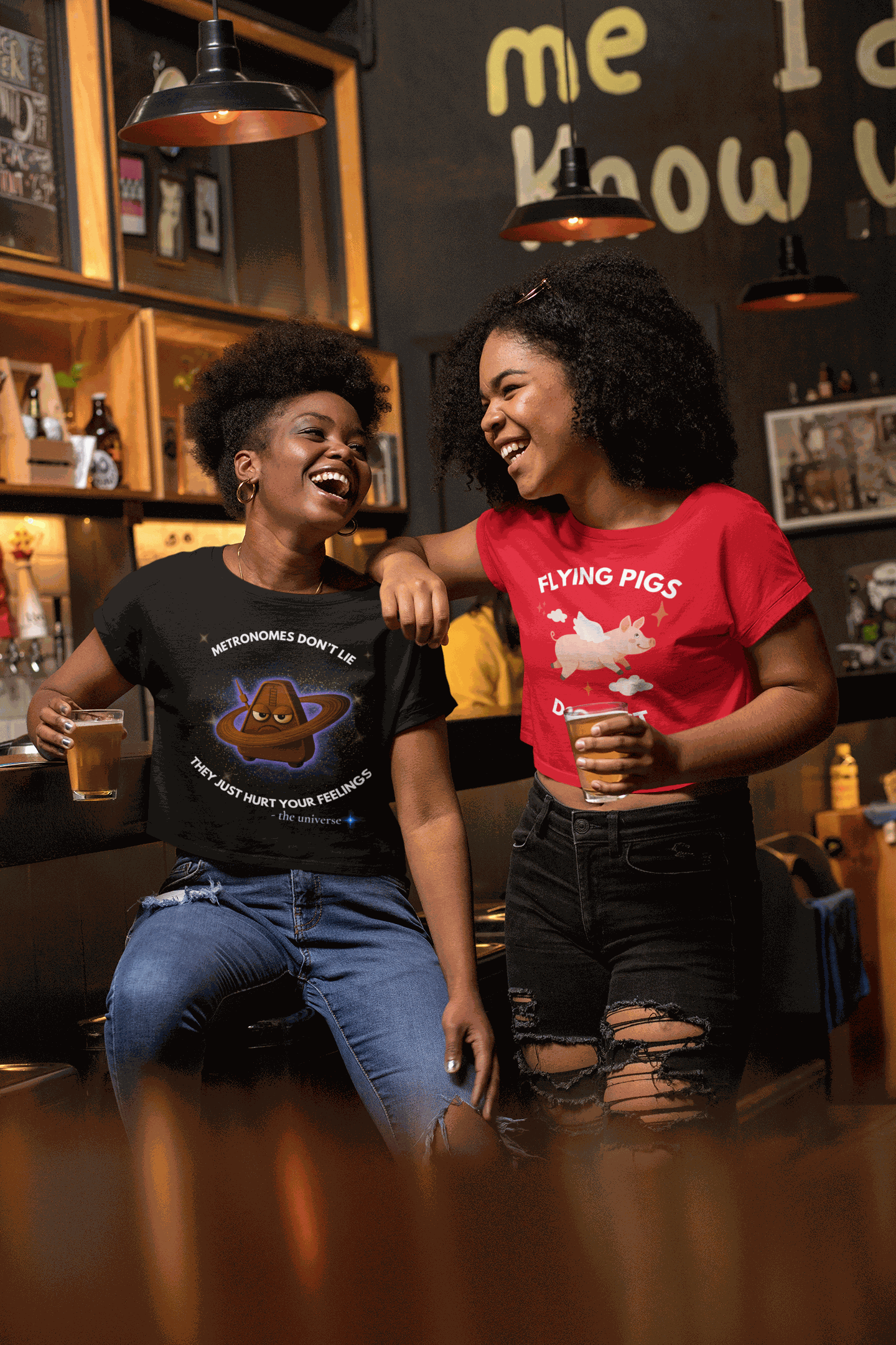 A black t-shirt with a graphic of an angry metronome in space.