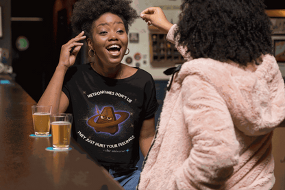 Black t-shirt with a graphic of an angry metronome in space.