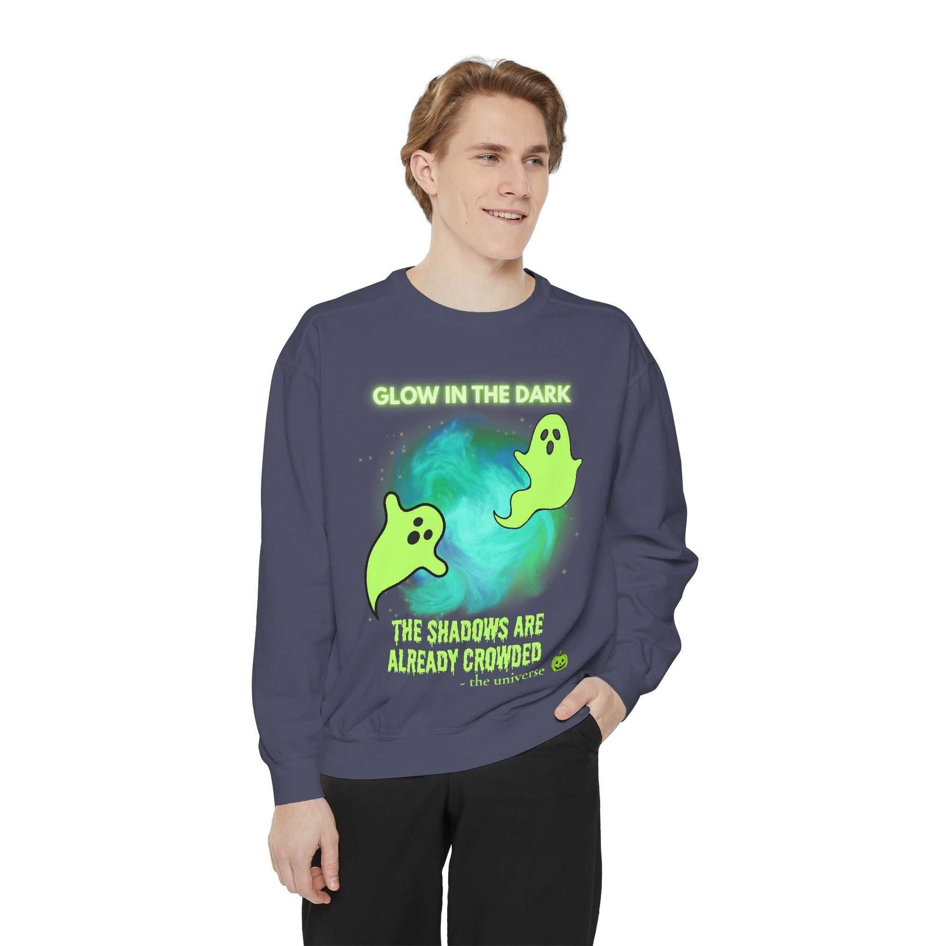 A dark blue sweatshirt with a glow-in-the-dark ghost design.