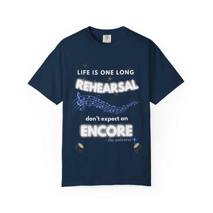 A navy t-shirt with the text "Life Is One Long Rehearsal Don't Expect an Encore" and musical notes.