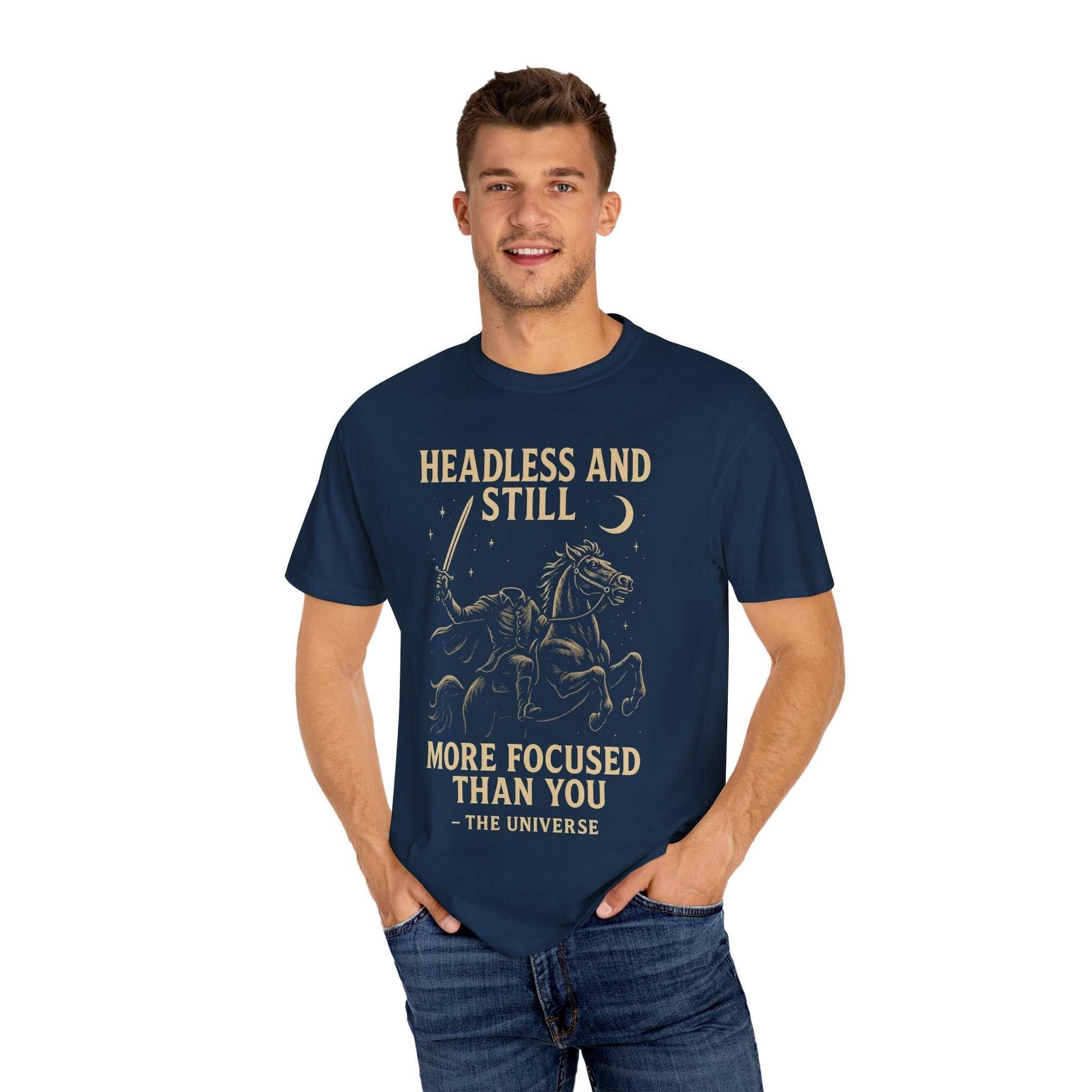 Man wearing navy Headless Horseman shirt with motivational Halloween design and text.