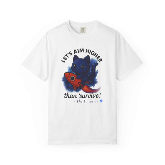 White Space Cat Tee with a midnight blue cat riding a red rocket and "Let's Aim Higher than 'survive.'" inspirational text design