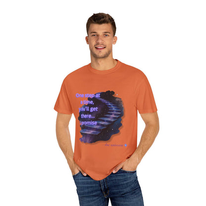 Man wearing orange Comfort Colors Motivational Stairway T-Shirt with starry staircase and text "One step at a time, you'll get there... I promise"