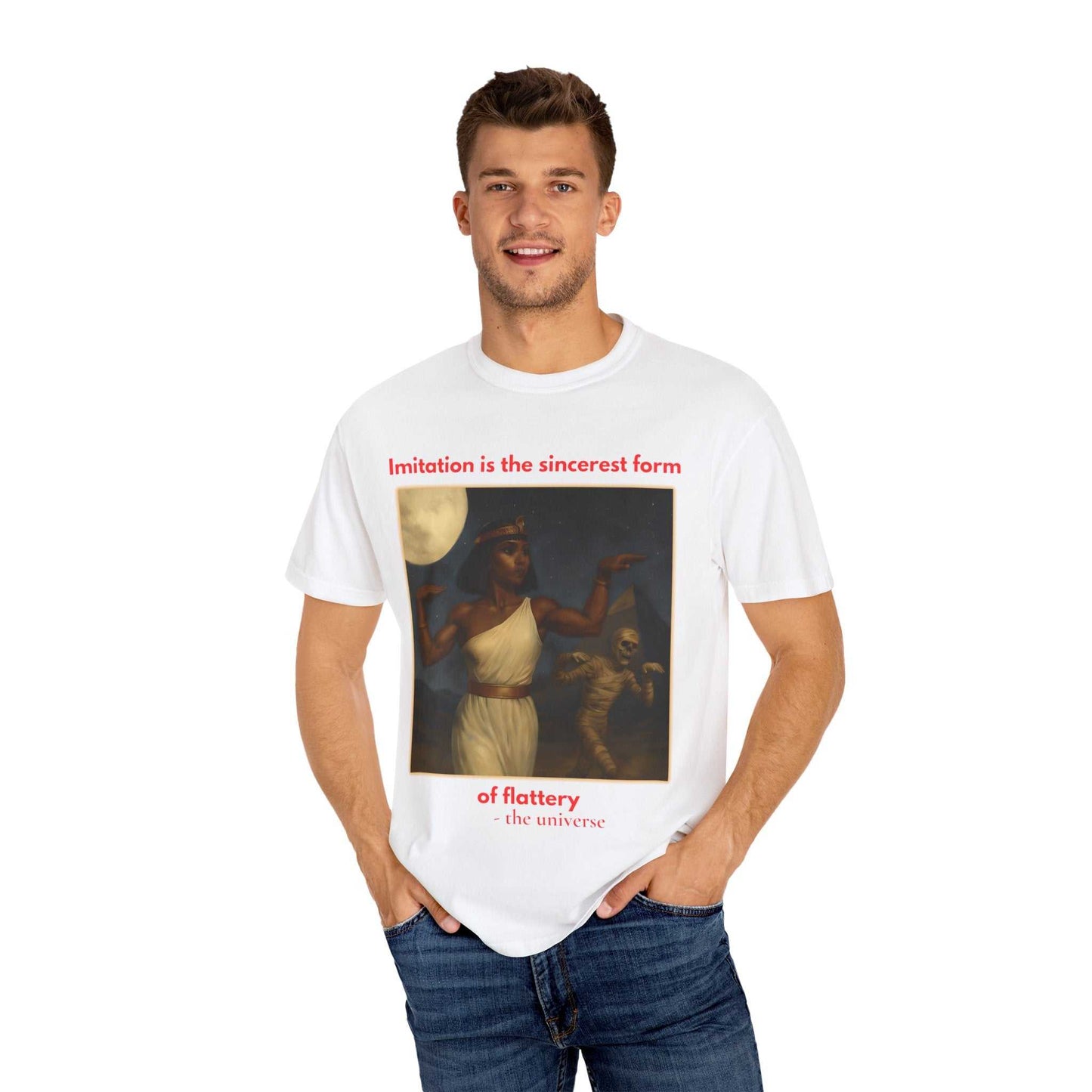 Man wearing white Egyptian Mummy T-Shirt with Cleopatra and mummy graphic and red text design