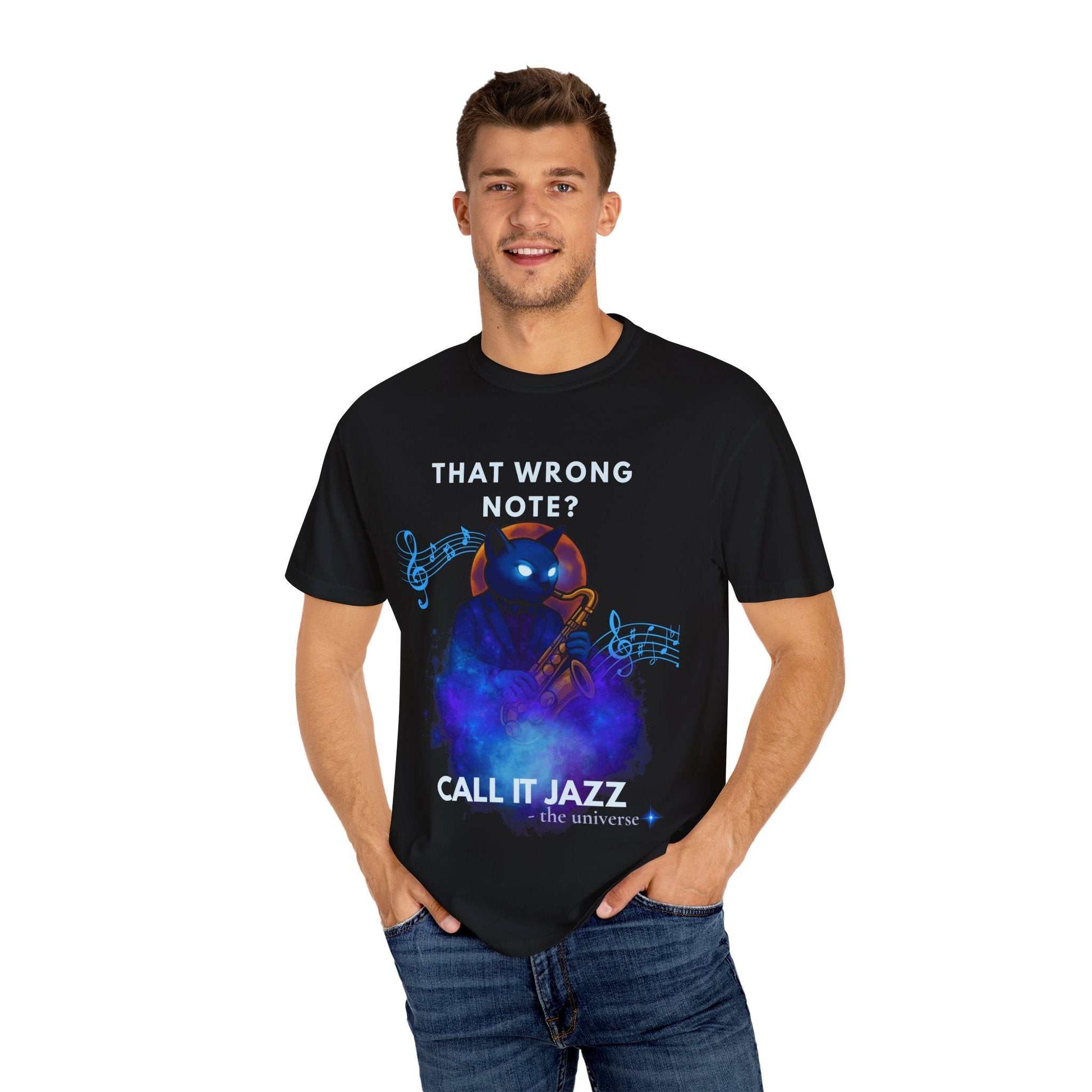 A black t-shirt with a cosmic cat playing a saxophone and the text "That Wrong Note? Call It Jazz".
