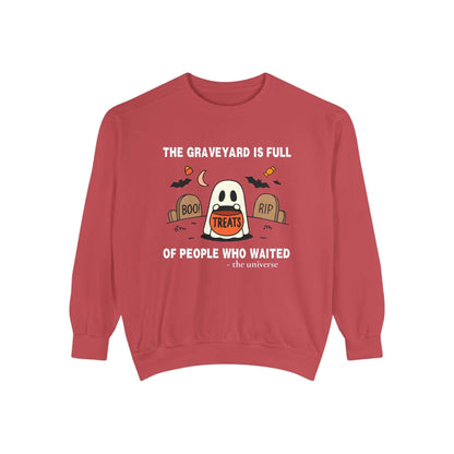 Red sweatshirt with a Halloween ghost and graveyard design.
