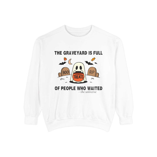 Comfort Colors ghost in graveyard Halloween sweatshirt with spooky ghost holding treats and tombstones design