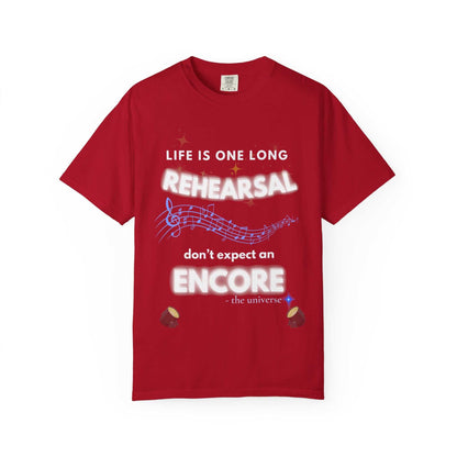 Red t-shirt with "Life Is One Long Rehearsal, Don't Expect an Encore" text and music notes.