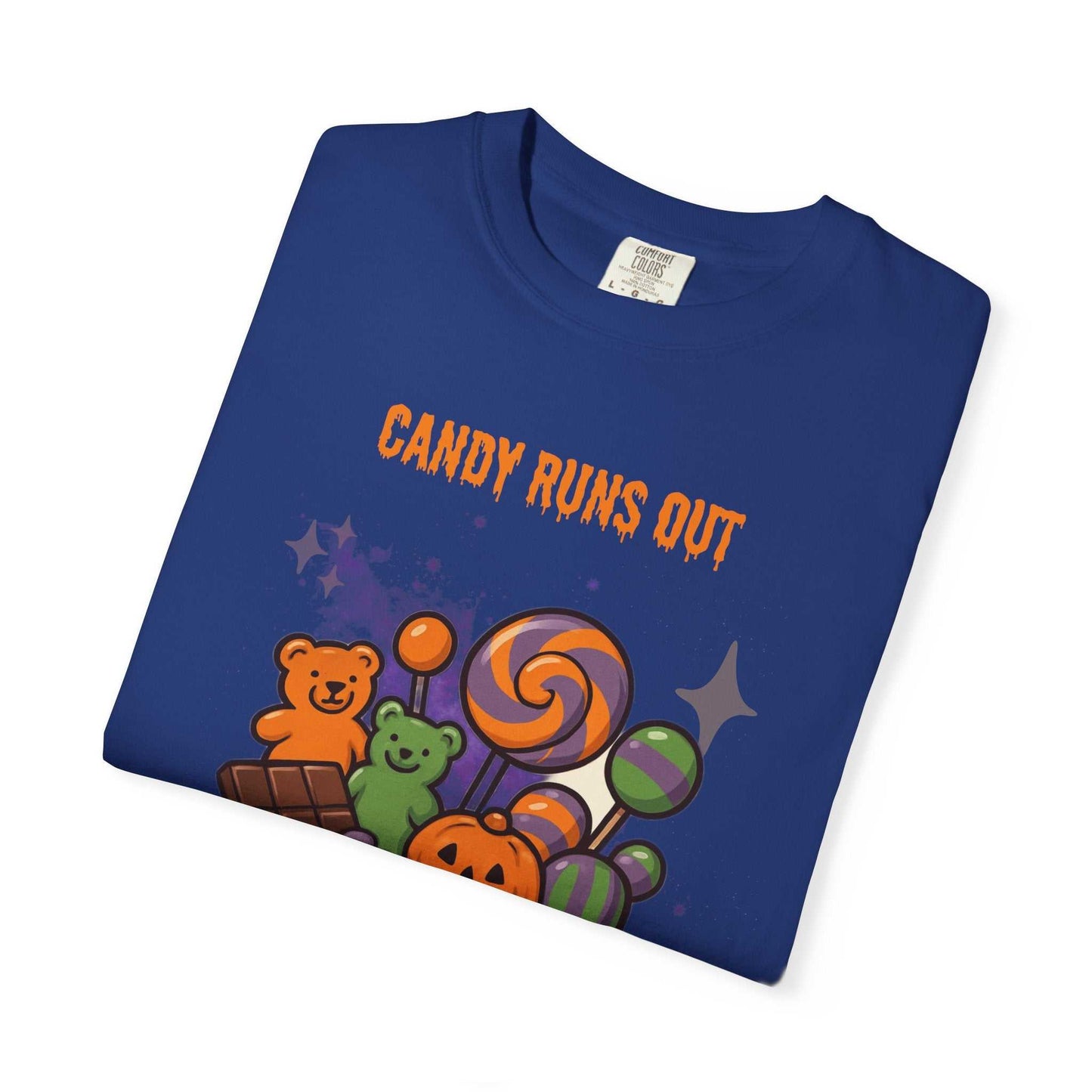 A blue t-shirt with the text "Candy Runs Out" and Halloween candy graphics.