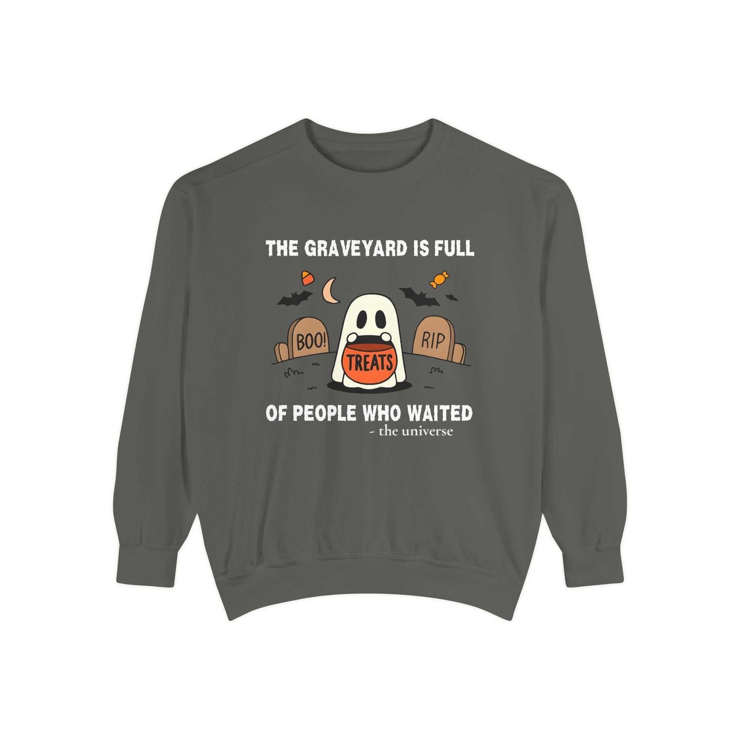 Sweatshirt with a ghost in a graveyard holding a treat bucket.