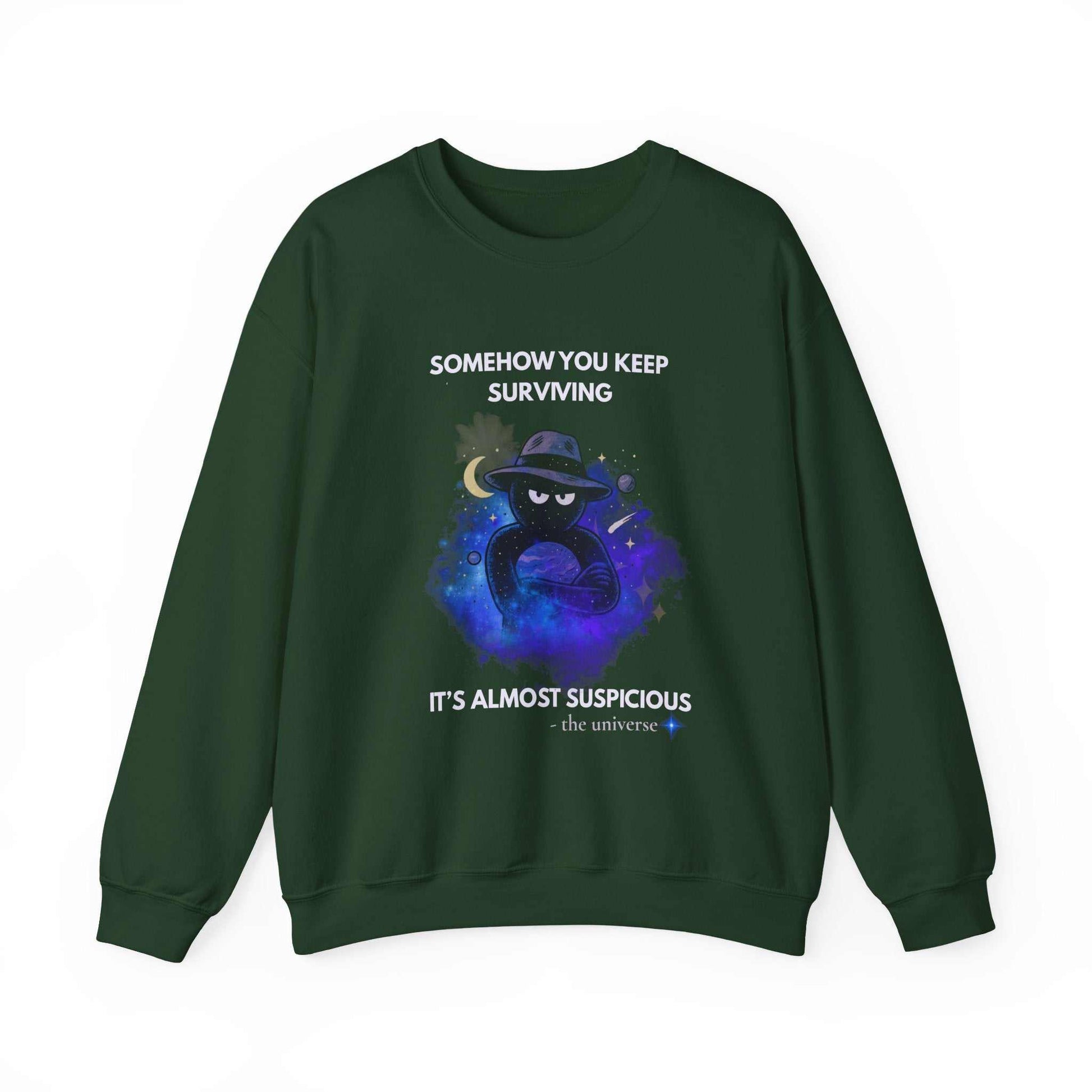 A dark green sweatshirt with a graphic of a figure in a hat in space and text that reads "Somehow you keep surviving. It's almost suspicious - the universe."