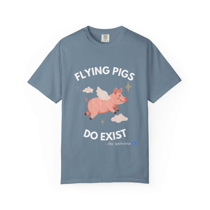 A blue t-shirt with a graphic of a flying pig and the text "Flying Pigs Do Exist".