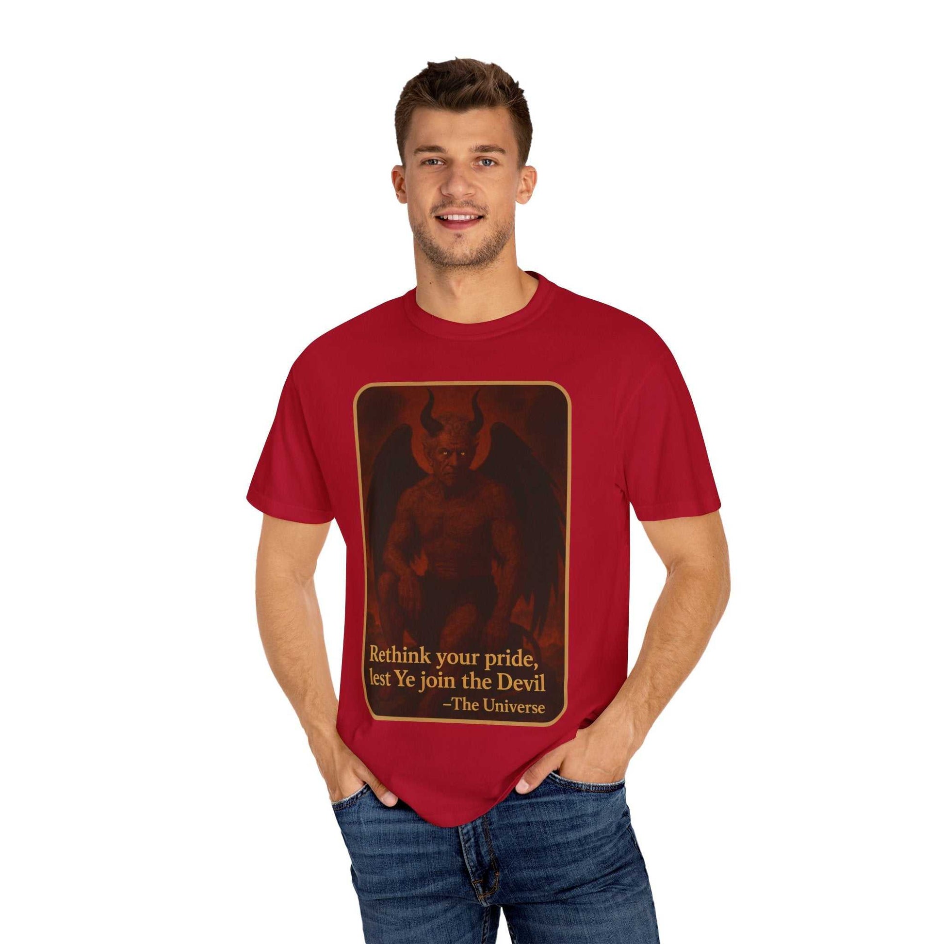 Man wearing red Devil Rethink Your Pride unisex garment-dyed cotton T-shirt with devil graphic and text on front