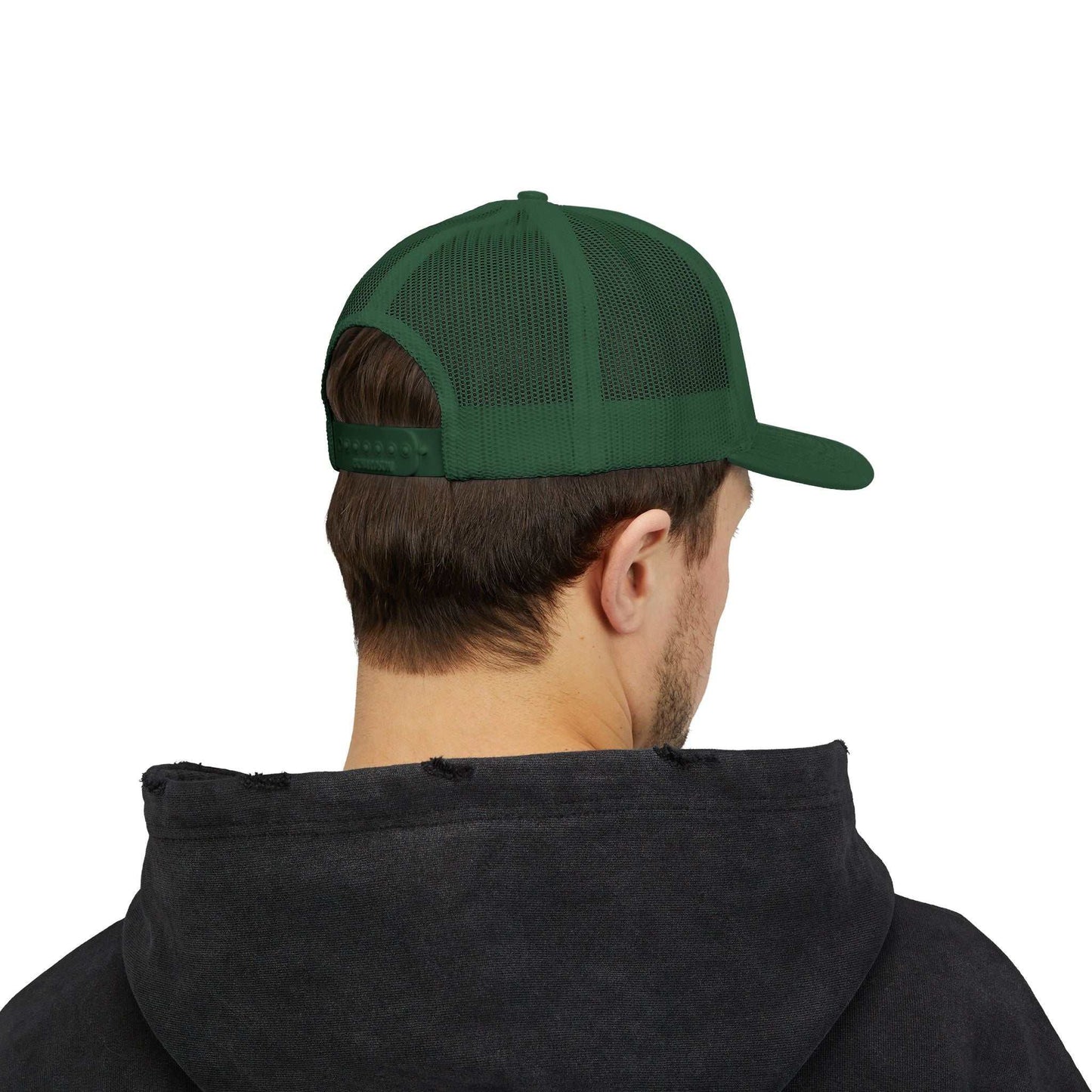 Back view of green Planet Smile Retro Cartoon Space Patch trucker cap with mesh back and snapback closure worn by person in black hoodie