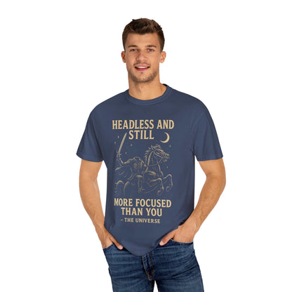 Man wearing navy blue Headless Horseman shirt with motivational Halloween design and text "Headless and still more focused than you"