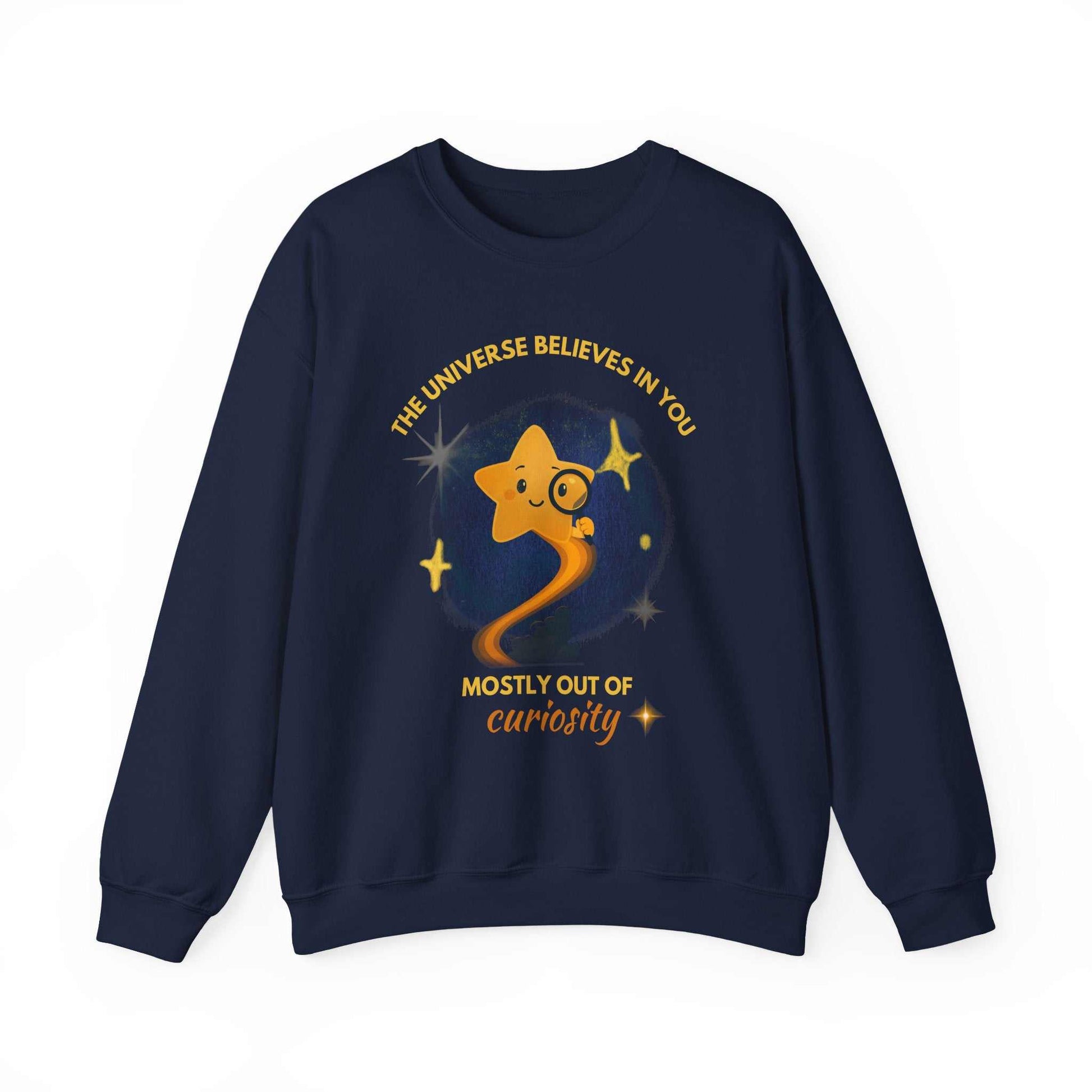 A navy sweatshirt with a graphic of a star looking through a magnifying glass and text about curiosity.
