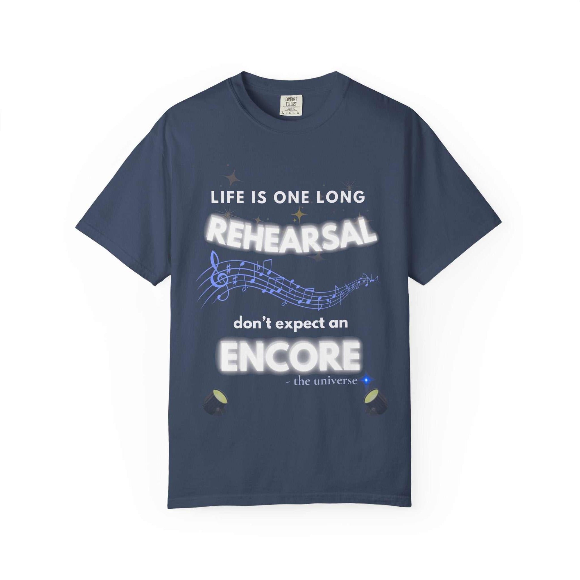 A navy t-shirt with the text "Life Is One Long Rehearsal, Don't Expect an Encore" and musical notes.
