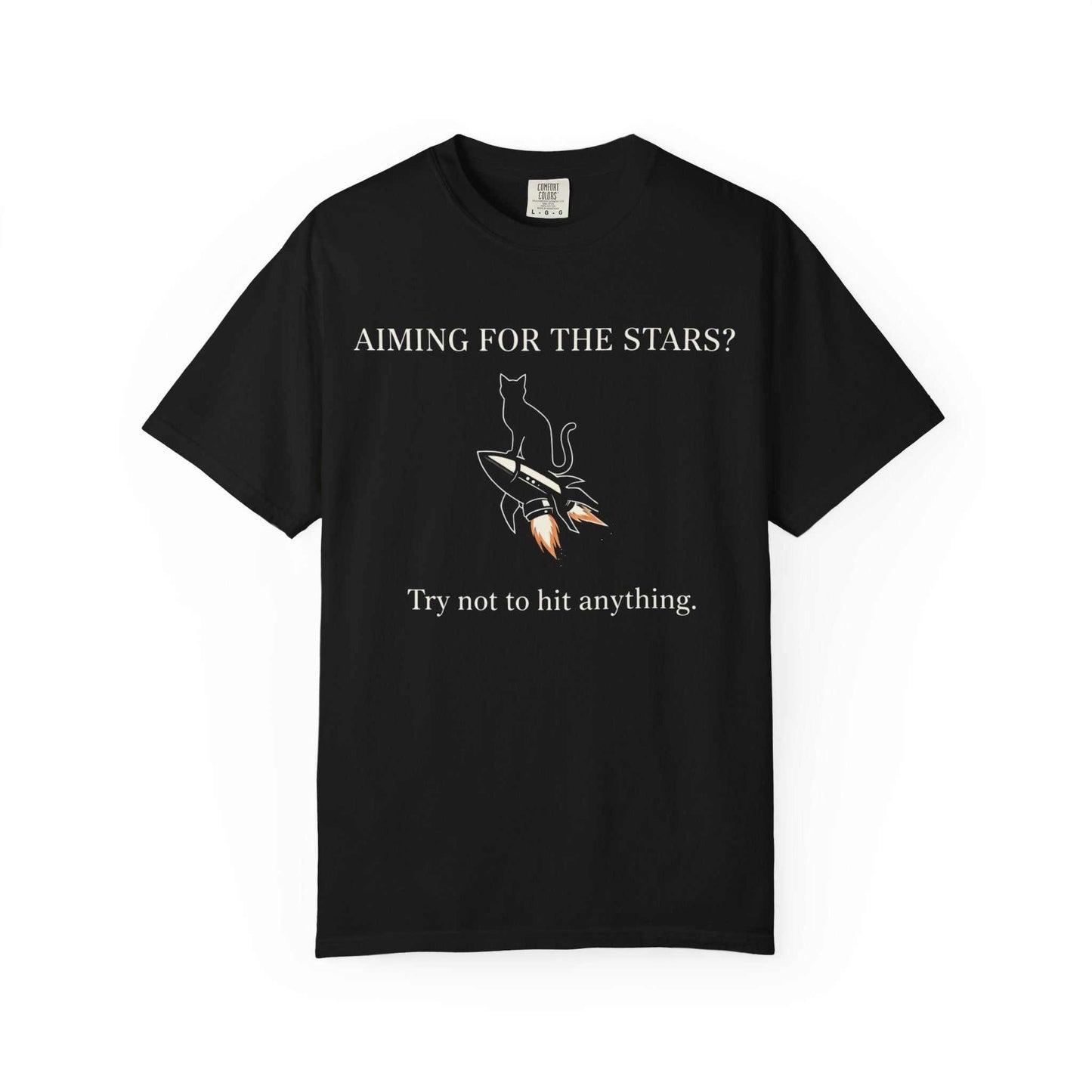 Black t-shirt featuring a cat on a rocket with text 'Aiming for the stars? Try not to hit anything.'