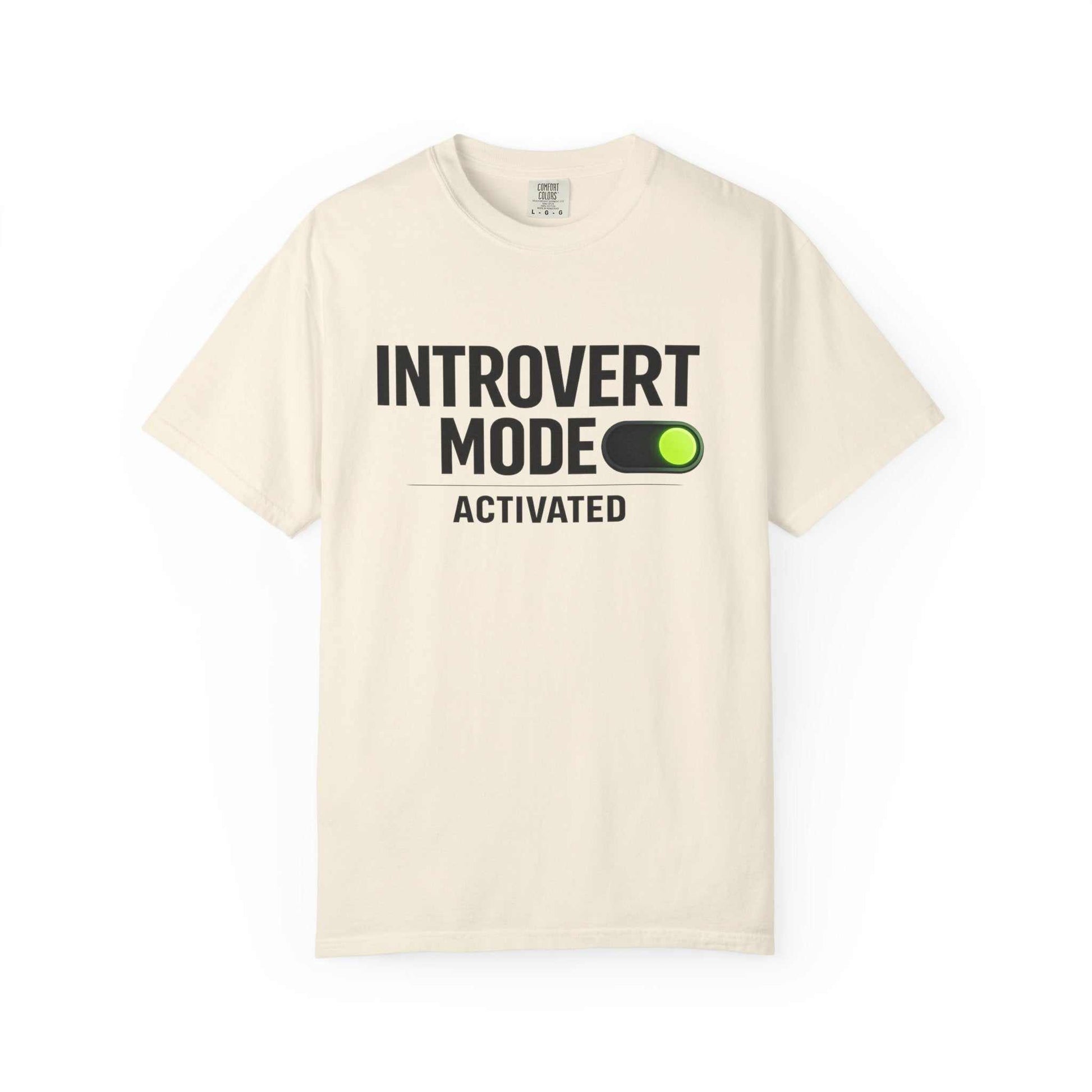 Beige Comfort Colors t-shirt with black text 'Introvert Mode Activated' and green switch graphic