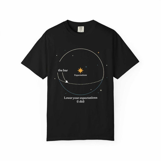 Black astronomy graphic tee with 'Lower Your Expectations' design, Youniverses store